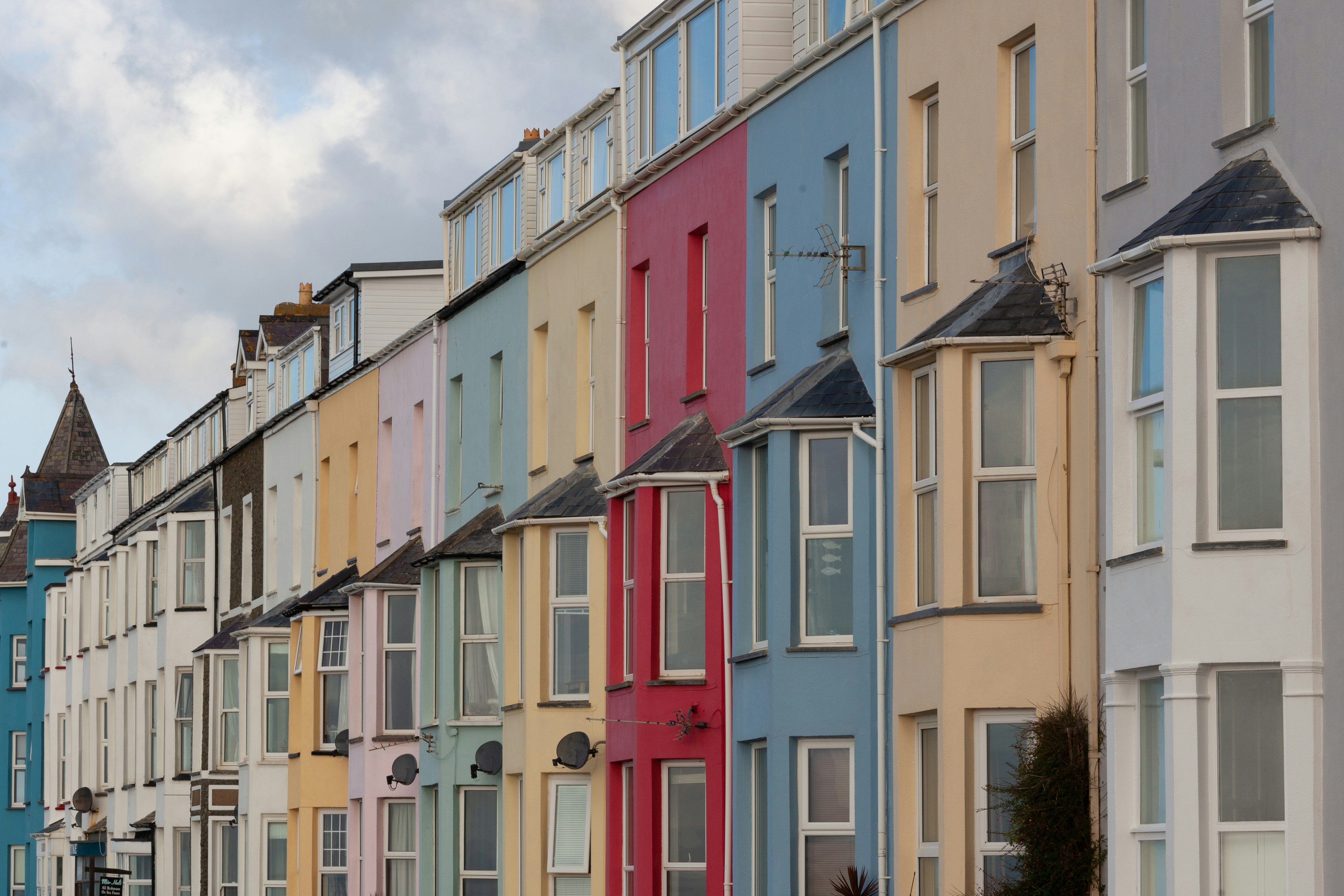 A row of colorfully painted town homes
